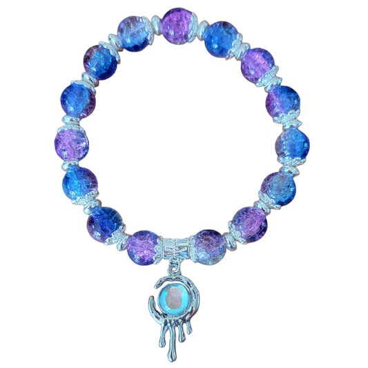 Glass Bead Bracelet- blue/purple with donut spacers and sun in moon charm