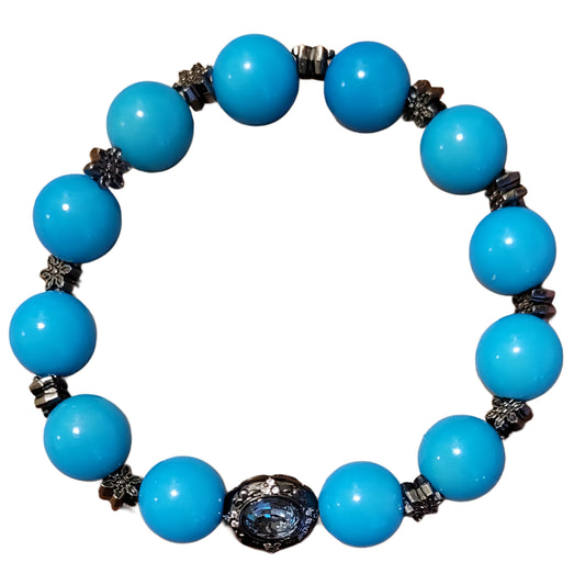 Bodhi Bracelet- Blue with black flower spacers and black oval charm
