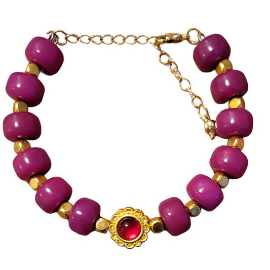 Bodhi Bracelet- Adjustable Pink with gold spacers and red golden charm